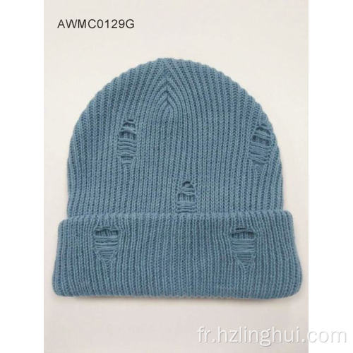 Traitement de trou de surface du bonnet de manchette en tricot d'hiver chaud